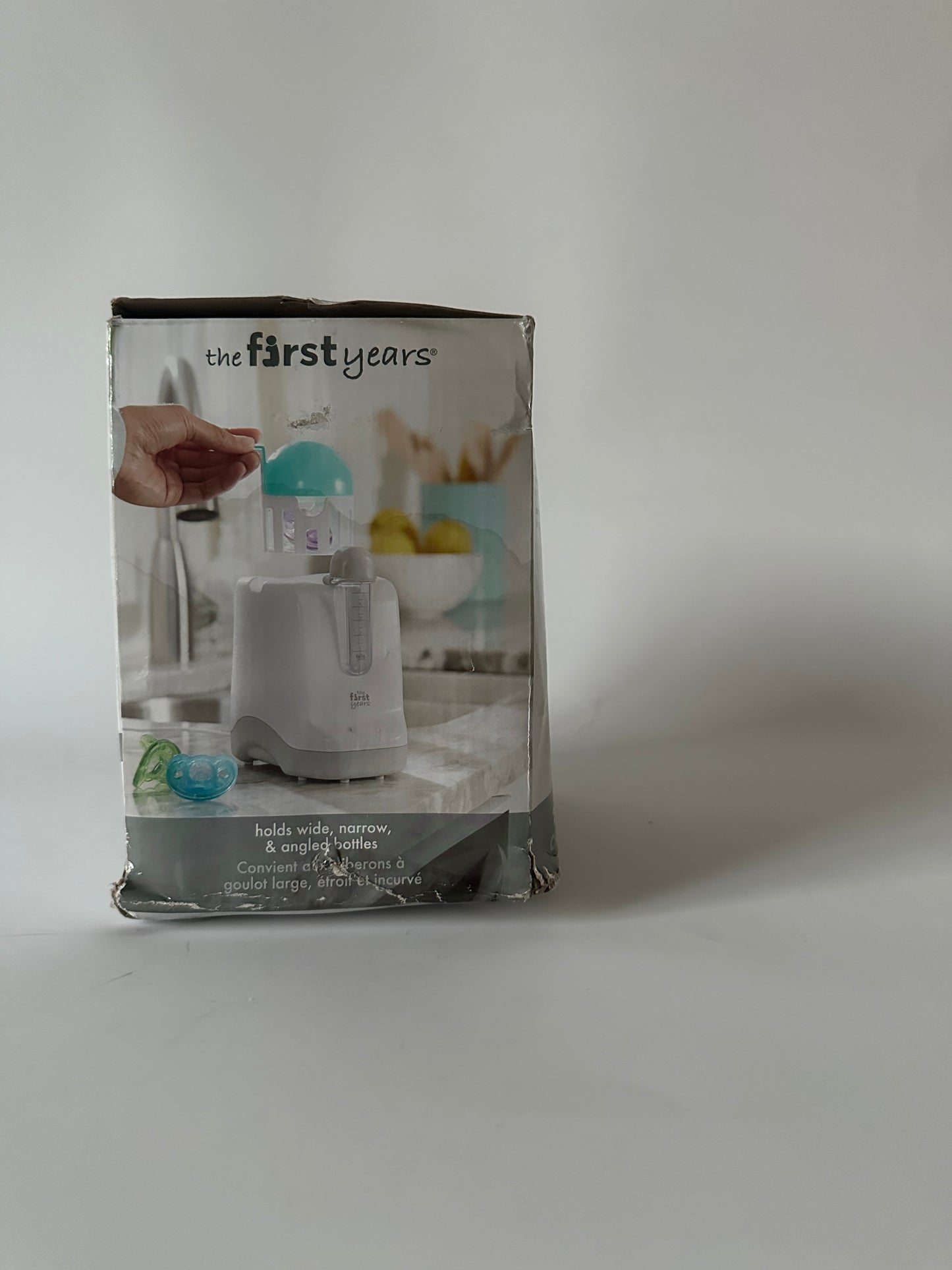 The First Years Baby Bottle Warmer and Sterilizer - Pacifier and Bottle Nipple Sanitizer - Feeding Baby Essentials for Formula or Breast Milk - Holds Multiple Sizes