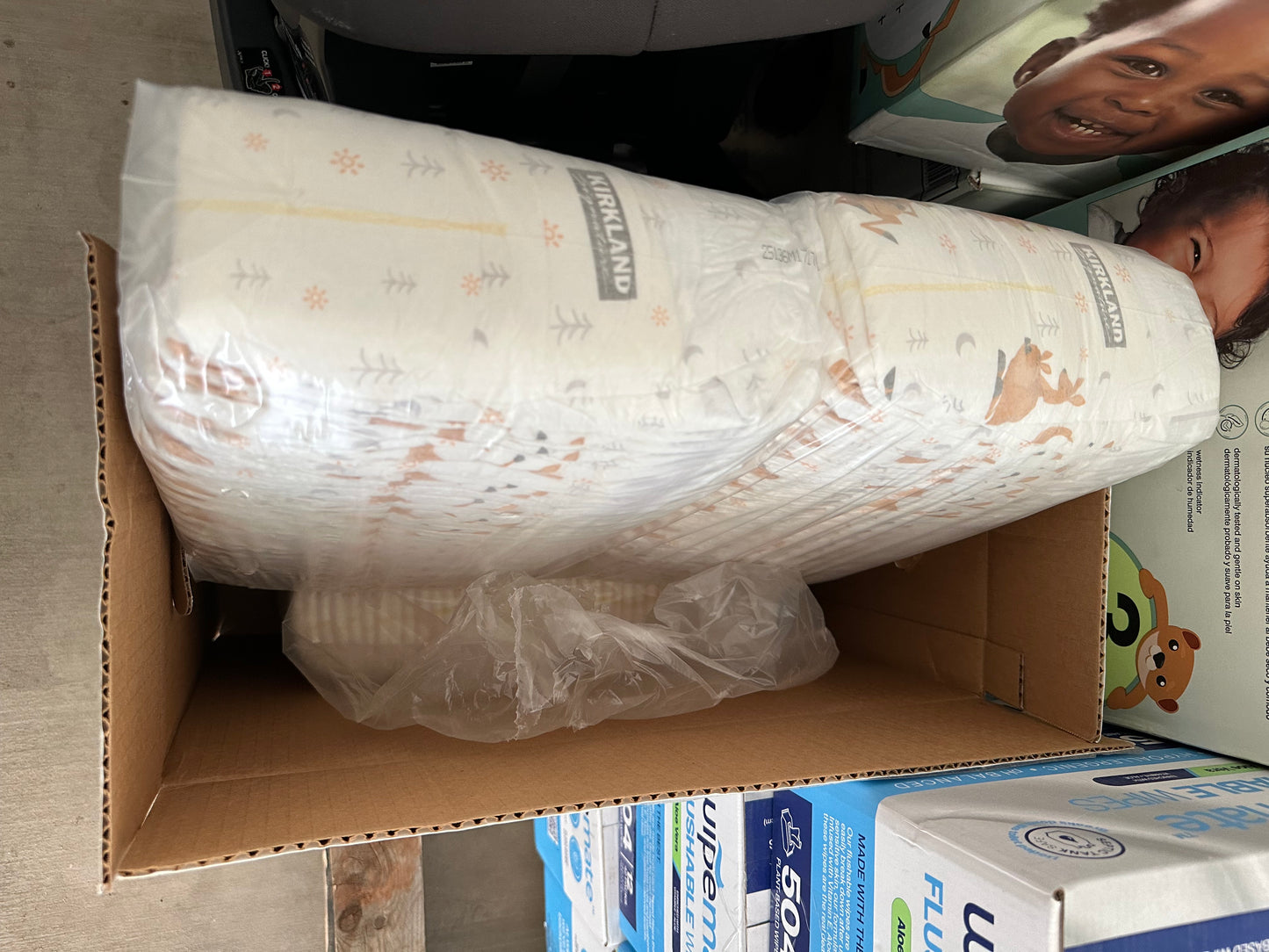 (Partial box - see pictures) size 5 costco diapers