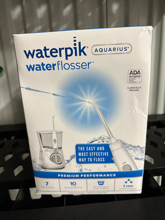 Waterpik Aquarius Water Flosser For Teeth Cleaning, Gums, Braces, Dental Care, Electric Power With 10 Settings, 7 Tips For Multiple Users And Needs, ADA Accepted, White WP-660, Packaging May Vary